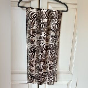Zebra print scarf. Polyester. Fantastic scarf to add interest to any outfit.